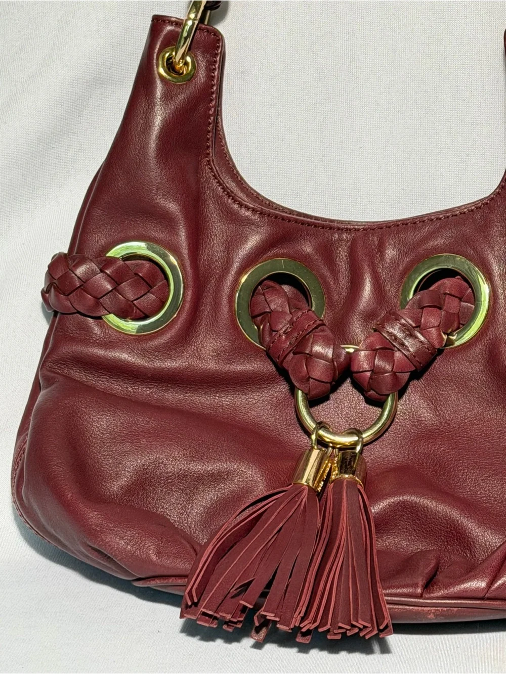 Michael Kors Burgundy Leather Braided Grommet Tassel Shoulder Bag Gold Hardware